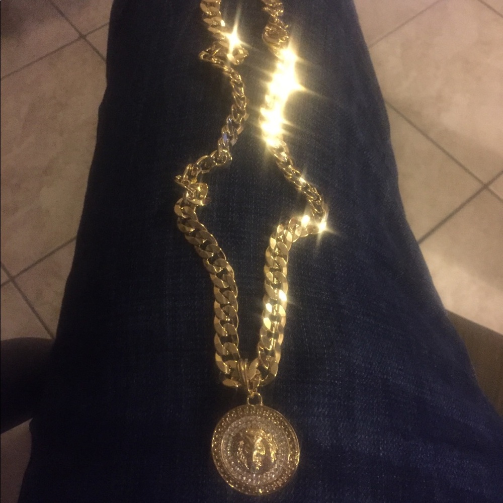 14k Gold 10mm cuban chain and charm